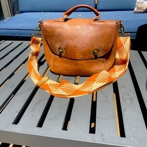 Anthropologie bag | pure brown leather | adjustable and detachable woven strap.